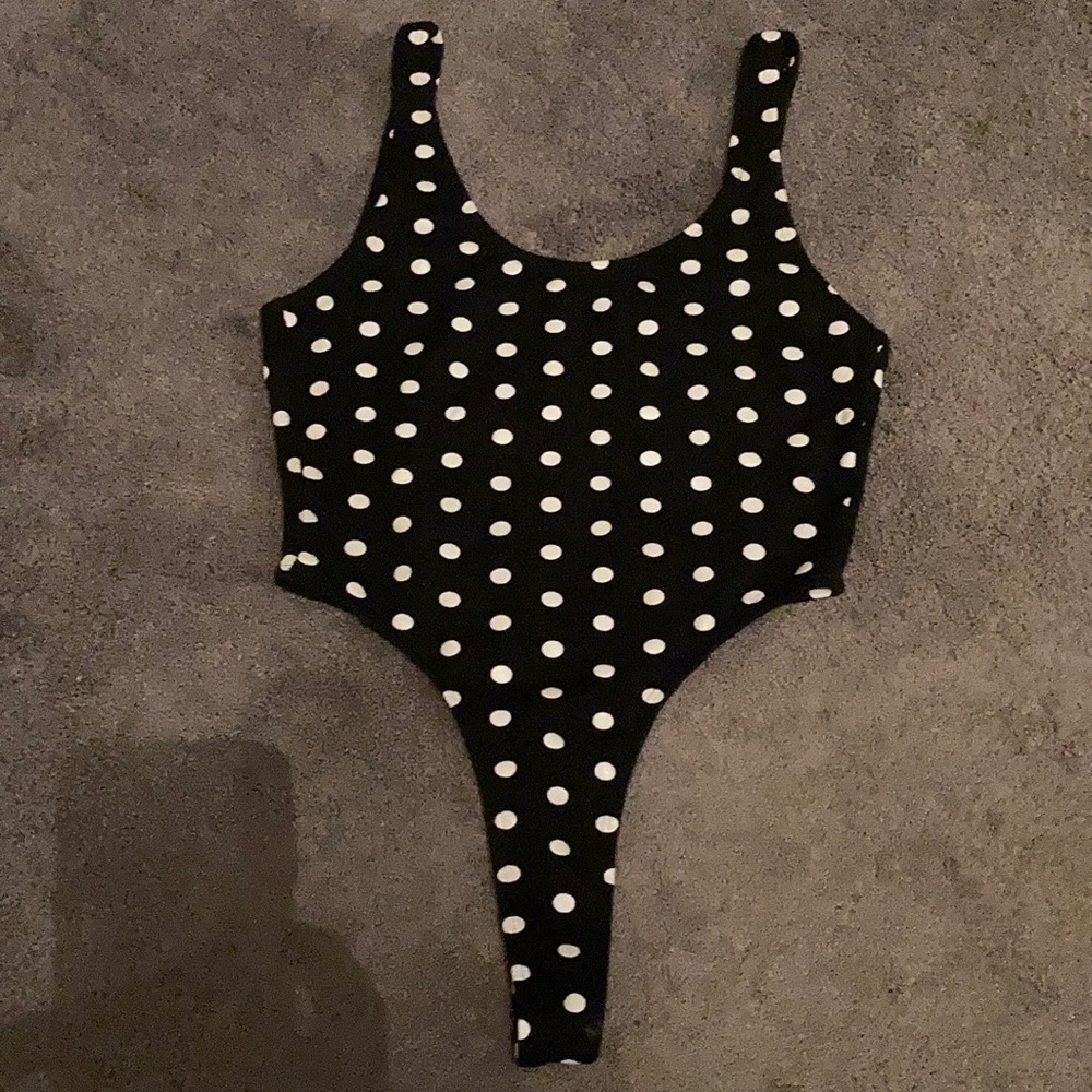 A thong bodysuit 🔥